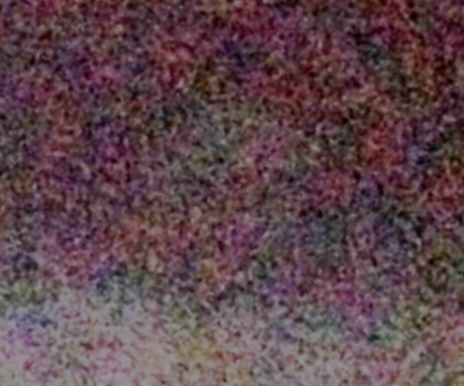 Enlarged crop of the area above the wall, in color, with a lot of grain
